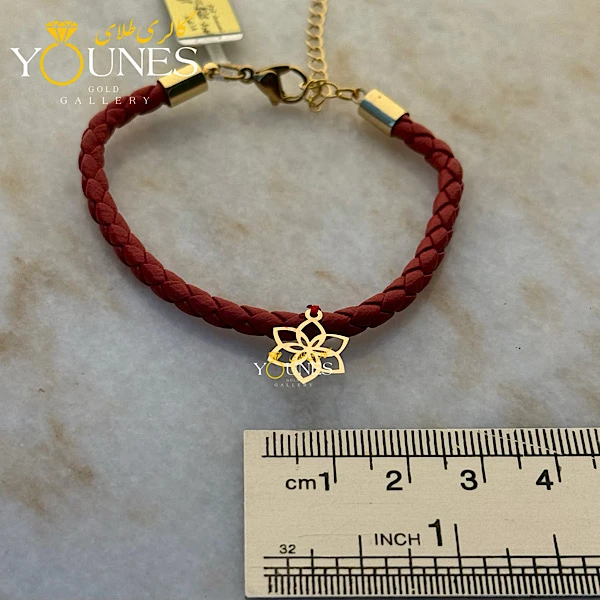 دستبند چرم گلبرگ طلا